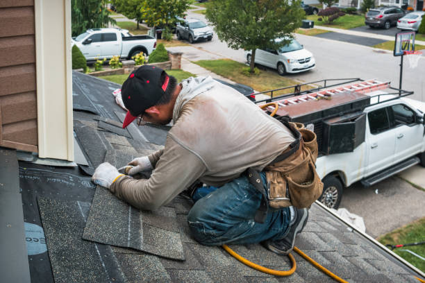 Professional Roof Replacement technician working in Cincinnatus, NY